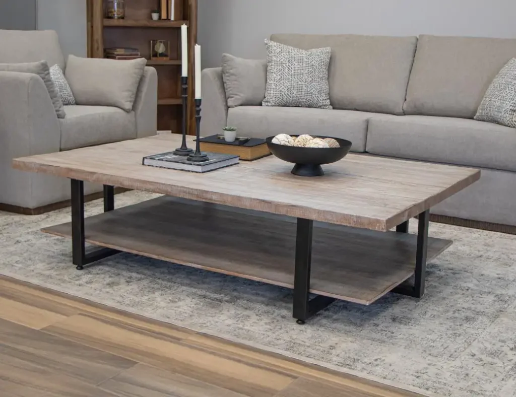 Old wood coffee table matched with a designer sofa